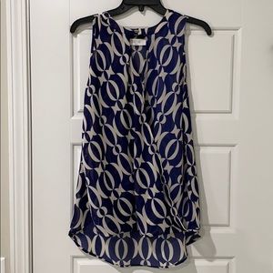 Navy blue and beige high-low sleeveless blouse